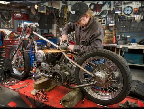 A man working on a Harley Davidson motorcycle for Made in America blog series