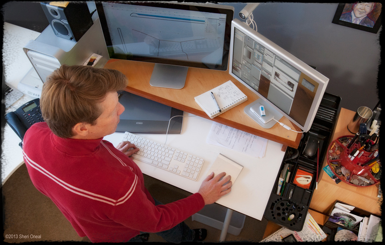 Joe Smith at desk