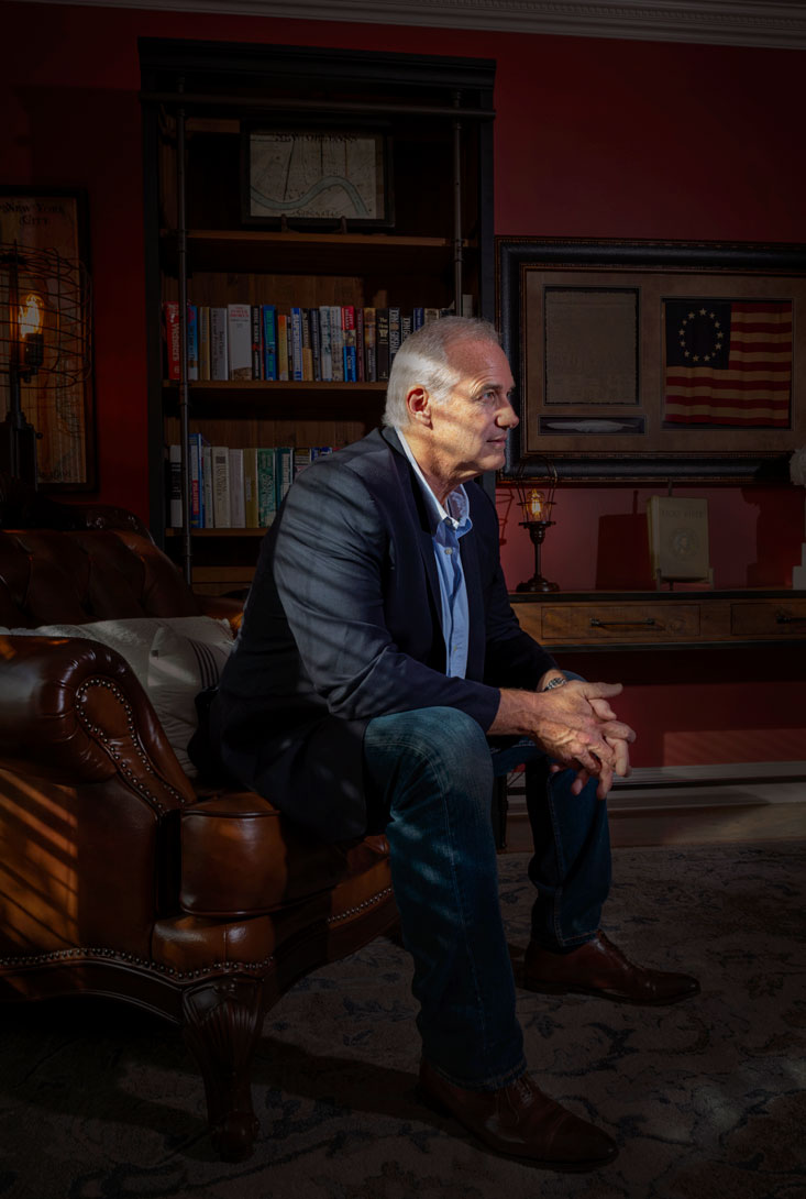 CEO Lerry Wilson of Splunk wearing a suit sitting in his home office in Nashville