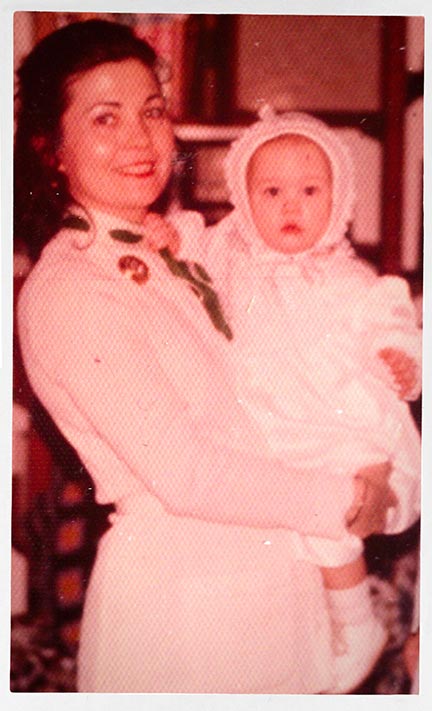 Payge McMahon in her mom's arms as a baby