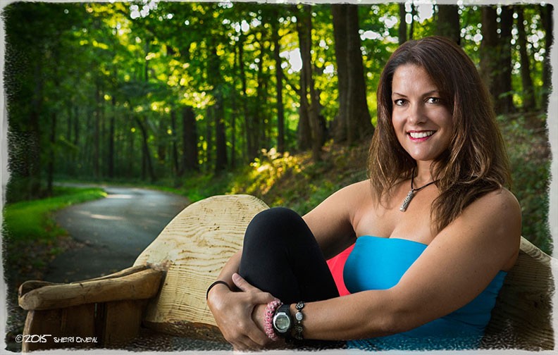 Fabulous Women over 40, Payge McMahon, adventure athlete and yoga instructor at Percy Warner Park sitting on a wooden bench at a resting area of the park in TN