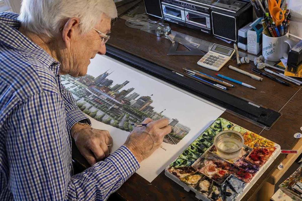 Phil Ponder painting Nissan stadium with watercolor paints