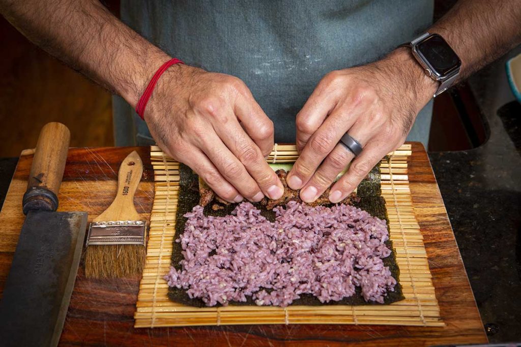 preparing to roll seaweed rolls